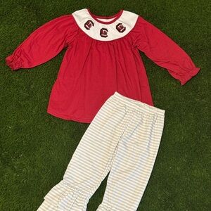 Gamecock outfit embroidered top and ruffle pants.